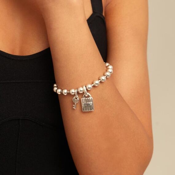 Серебряный браслет из сферических бусин с кулонами UNOde50 Silver key, изображение 2