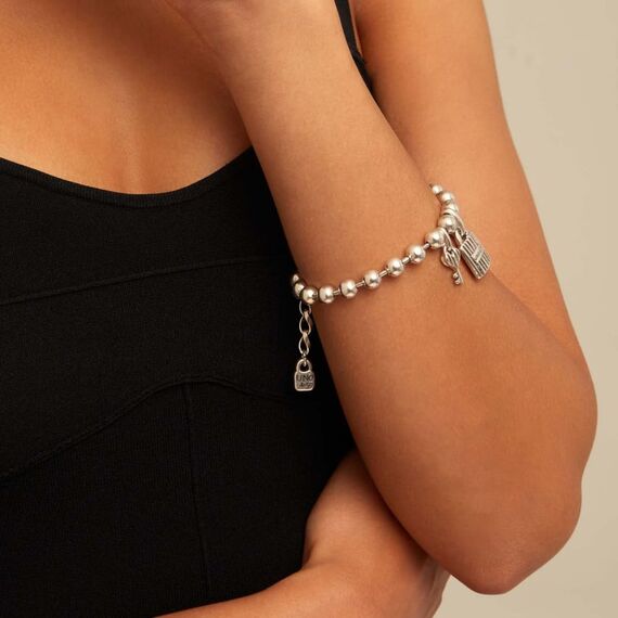 Серебряный браслет из сферических бусин с кулонами UNOde50 Silver key, изображение 3